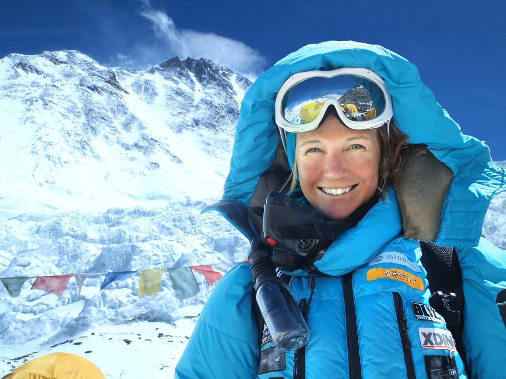 Climbing the highest peak in the world.