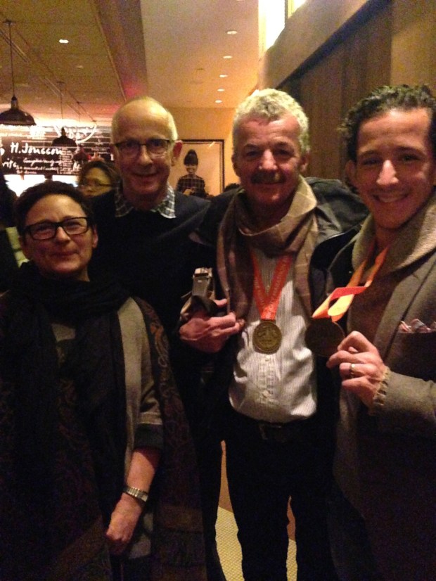 Proud marathoners with our coach (far left) post-race.