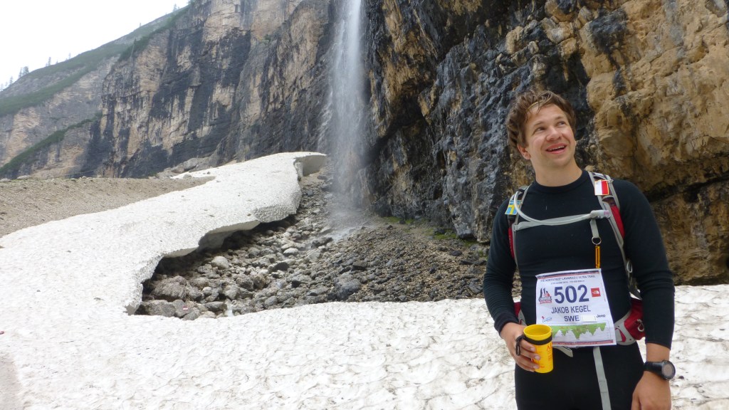 Taking a sip of water from the spring.